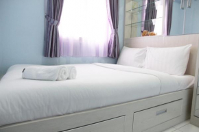 Comfortable 2BR Mutiara Bekasi Apartment By Travelio